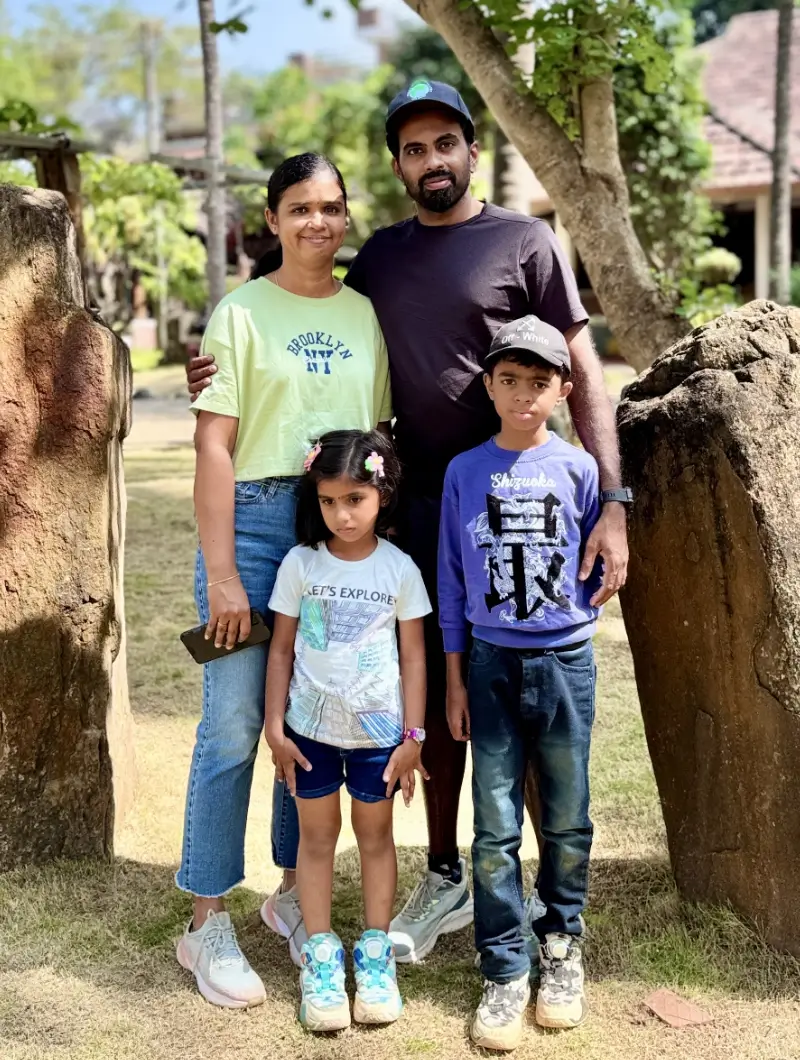 Tijo with family outdoors