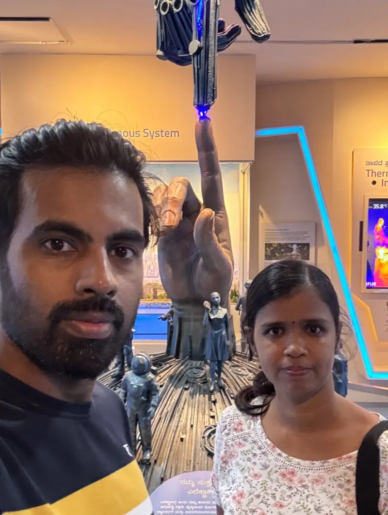 Tijo with his wife at a museum